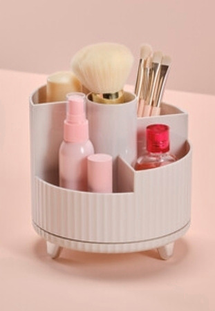 Säilytä meikit näppärästi pienessäkin tilassa, käyttämällä pyörivää meikkitelinettä, jossa useita lokeroita.